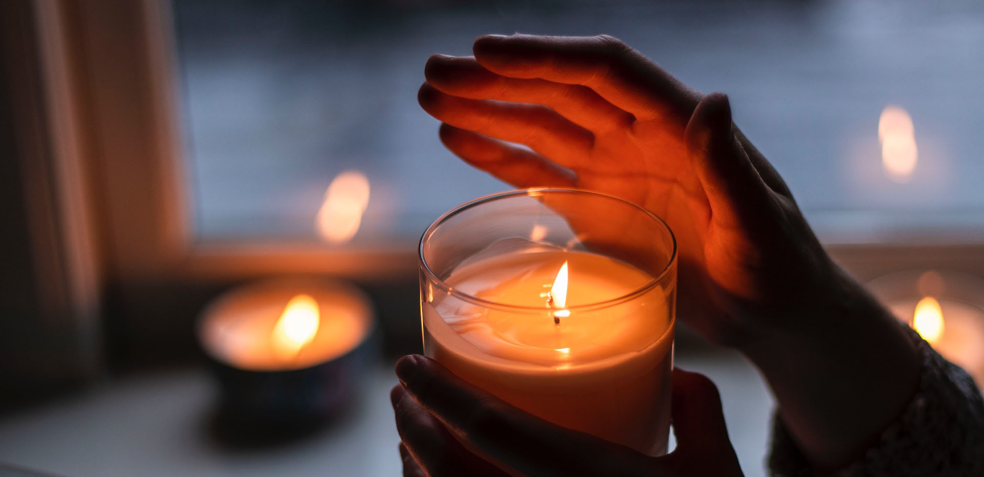Candle in hands Candle in hands